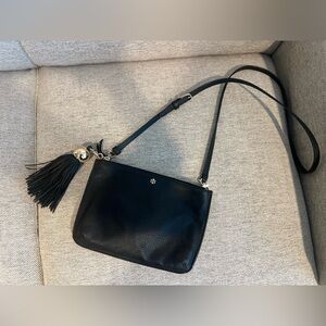 Tory Burch black pebbled leather crossbody bag with tassel